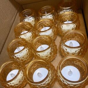 70 gold candle holders with tea lights